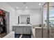 Modern bathroom featuring double sinks, soaking tub, shower, and walk in closet at 1123 Dora Parc Ln, Mount Dora, FL 32757