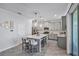Modern kitchen with a center island, stainless steel appliances, and pendant lighting at 1123 Dora Parc Ln, Mount Dora, FL 32757