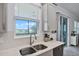 Beautiful kitchen featuring a stainless steel sink, a window view, and modern appliances at 1123 Dora Parc Ln, Mount Dora, FL 32757