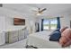 Bright main bedroom with ample closet space, natural light, and stylish décor at 1123 Dora Parc Ln, Mount Dora, FL 32757