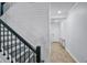 Stylish staircase with wooden steps at 1123 Dora Parc Ln, Mount Dora, FL 32757