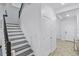 Stylish staircase with shiplap accents and modern design at 1123 Dora Parc Ln, Mount Dora, FL 32757