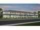 Beautiful new construction townhomes with lush landscaping and modern design at 11368 Blue Bay Dr, Orlando, FL 32832