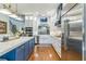Well-appointed kitchen with state-of-the-art appliances and an open layout at 1166 Adair Park Pl, Orlando, FL 32804
