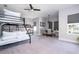 Spacious bedroom with bunk beds, dining area, carpeted flooring, and natural light at 1311 Arisha Dr, Kissimmee, FL 34746