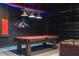 Spacious game room featuring a pool table and foosball table, great for entertainment at 1311 Arisha Dr, Kissimmee, FL 34746