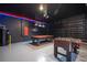 Large game room with a pool table and foosball table, perfect for Gathering fun at 1311 Arisha Dr, Kissimmee, FL 34746