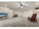 Spacious bonus room with carpet flooring, ceiling fan, and ample natural light at 13462 Panama Beach Ct, Orlando, FL 32827