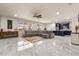 Bright, open-concept living space with modern kitchen and plenty of room to relax at 13462 Panama Beach Ct, Orlando, FL 32827