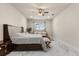 The main bedroom features an en suite bathroom and windows with backyard views at 13462 Panama Beach Ct, Orlando, FL 32827
