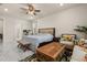 The main bedroom features an en suite bathroom and windows with backyard views at 13462 Panama Beach Ct, Orlando, FL 32827