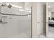 This shower features glass door, large format tile and multiple shower heads at 13462 Panama Beach Ct, Orlando, FL 32827