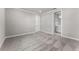 Open-concept bedroom area with neutral walls and plush carpet at 13758 Tybee Beach Ln, Orlando, FL 32827