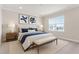 Well-staged bedroom with a bench seat and large window offering abundant natural light at 13758 Tybee Beach Ln, Orlando, FL 32827