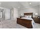Spacious main bedroom showcasing neutral walls, carpet, and an expansive view of the home at 13758 Tybee Beach Ln, Orlando, FL 32827