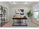 Bright office space with natural light, modern desk, comfortable chair, and stylish decor at 13758 Tybee Beach Ln, Orlando, FL 32827