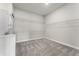 Spacious walk-in closet with built-in shelving and a laundry area for added convenience at 13758 Tybee Beach Ln, Orlando, FL 32827