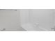 Clean white tiled shower and tub combination at 14538 Orchid Island Dr, Orlando, FL 32827