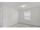 Bright, carpeted bedroom with a window at 14538 Orchid Island Dr, Orlando, FL 32827
