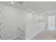 Bright hallway with white walls and carpet at 14538 Orchid Island Dr, Orlando, FL 32827
