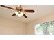 Bedroom featuring a ceiling fan and a window overlooking the outdoors at 1515 Pelican St, Longwood, FL 32750
