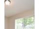 Bright bedroom with light-colored walls and natural light filtering through the window at 1515 Pelican St, Longwood, FL 32750