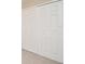 Bedroom closet with four white doors at 1515 Pelican St, Longwood, FL 32750