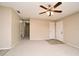 Spacious living room featuring new flooring and a ceiling fan at 1515 Pelican St, Longwood, FL 32750