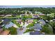 A beautiful view of a waterfront community, showcasing homes with private docks and canal access for boating at 1620 Texas Ct, Tavares, FL 32778
