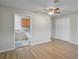 Spacious bedroom with ensuite bathroom and closet, all with modern finishes at 1620 Texas Ct, Tavares, FL 32778