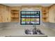 Kitchen sink area with open shelving and view to pool at 1620 Texas Ct, Tavares, FL 32778