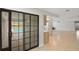Living area with views of the pool through the sliding glass doors at 1620 Texas Ct, Tavares, FL 32778
