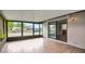 Enclosed lanai with vinyl floors overlooking the waterway at 1620 Texas Ct, Tavares, FL 32778