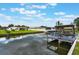 Scenic waterfront property with a private dock and boat lift, perfect for boating and fishing at 1620 Texas Ct, Tavares, FL 32778