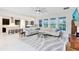 Open-concept floor plan with spacious living room, modern kitchen, and lots of natural light at 16696 Otterchase Ln, Winter Garden, FL 34787