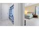 Entryway with mudroom storage bench and bedroom entrance at 16696 Otterchase Ln, Winter Garden, FL 34787