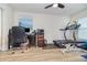 Multi-purpose room as home office with desk, computer, treadmill, and weight bench at 186 Nw 44Th St, Ocala, FL 34475