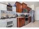 Well-equipped kitchen featuring stainless steel appliances, granite countertops, and a cozy coffee bar at 186 Nw 44Th St, Ocala, FL 34475