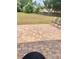 Spacious backyard featuring a paver patio and well-maintained lawn at 1980 Aquarius Ct, Oviedo, FL 32766