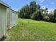 Large backyard with storage shed, open space, and grassy lawn at 1980 Aquarius Ct, Oviedo, FL 32766