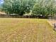 Expansive backyard offering a serene escape with plenty of green space and mature trees for privacy and enjoyment at 1980 Aquarius Ct, Oviedo, FL 32766
