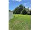Large backyard with storage shed, open space, and grassy lawn at 1980 Aquarius Ct, Oviedo, FL 32766