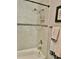 Stylish shower showcasing sleek tiling, modern fixtures, and a functional design for a refreshing experience at 1980 Aquarius Ct, Oviedo, FL 32766