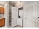 Convenient laundry closet with stacked washer and dryer near the stairs at 2204 San Vittorino Cir # 102, Kissimmee, FL 34741