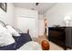 Bedroom featuring a daybed, a dark wood dresser, and carpeted floors at 2249 Palmetum Loop, Apopka, FL 32712