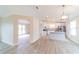 Bright and spacious kitchen with an island, stainless steel appliances, and modern finishes at 2486 Ainsworth Ave, Deltona, FL 32738