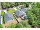 Spacious home featuring a well-maintained yard, complete with a charming playhouse for outdoor fun at 25106 Quaker Ridge Ave, Sorrento, FL 32776