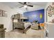 Comfortable bedroom with bunk beds, cozy armchair, and a vibrant accent wall, perfect for  at 25106 Quaker Ridge Ave, Sorrento, FL 32776