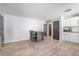 Open layout featuring dining room area and adjacent kitchen at 25106 Quaker Ridge Ave, Sorrento, FL 32776