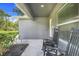 Inviting front porch with rocking chairs offers a relaxing outdoor space at 25106 Quaker Ridge Ave, Sorrento, FL 32776